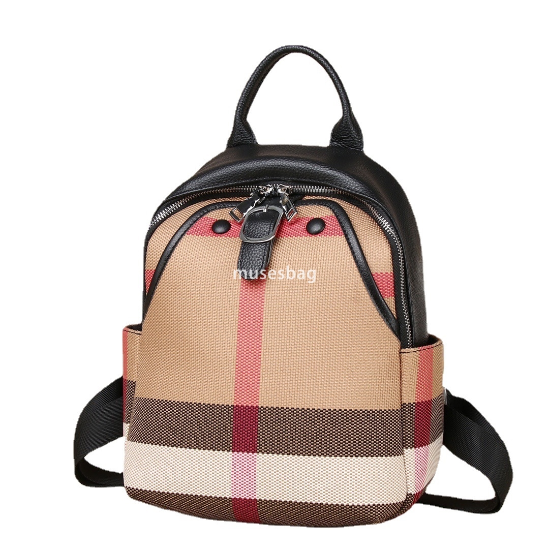 A niche design European and American retro leather canvas backpack women's new daily travel backpack commuting essential crossbody bag handbag