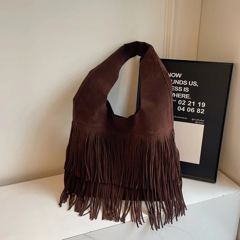 Solid and fashionable PU shoulder bag with tassel large capacity buckle sewing thread casual handbag selling womens bag 240930