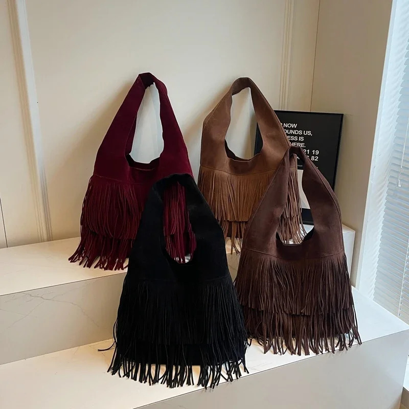 Solid and fashionable PU shoulder bag with tassel large capacity buckle sewing thread casual handbag selling womens bag 240930