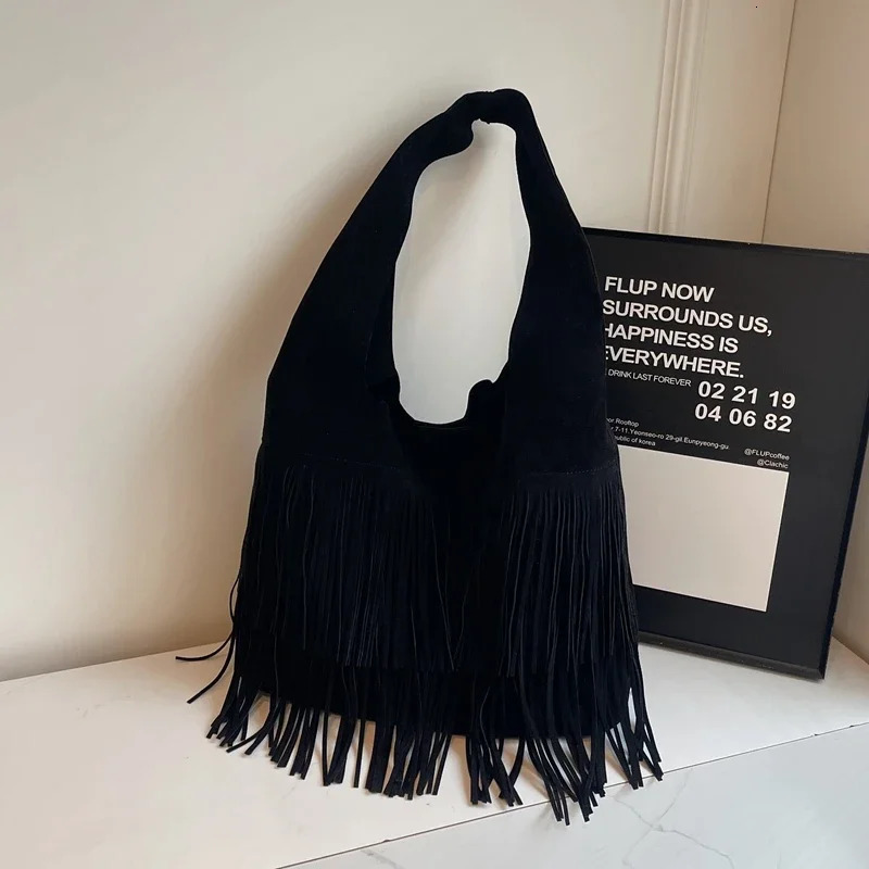 Solid and fashionable PU shoulder bag with tassel large capacity buckle sewing thread casual handbag selling womens bag 240930