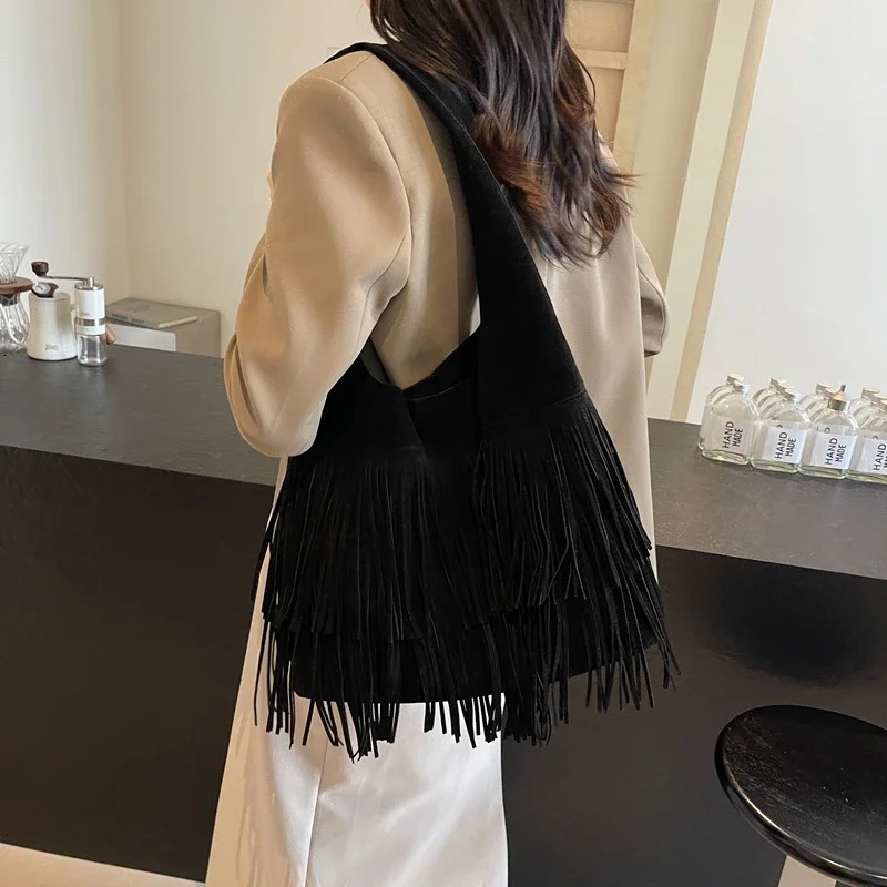 Solid and fashionable PU shoulder bag with tassel large capacity buckle sewing thread casual handbag selling womens bag 240930