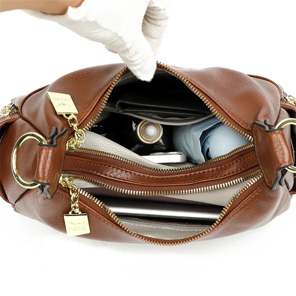 Vintage womens leather shoulder bag luxurious womens large capacity handbag casual shoulder bag fashionable Versatile bag 240930