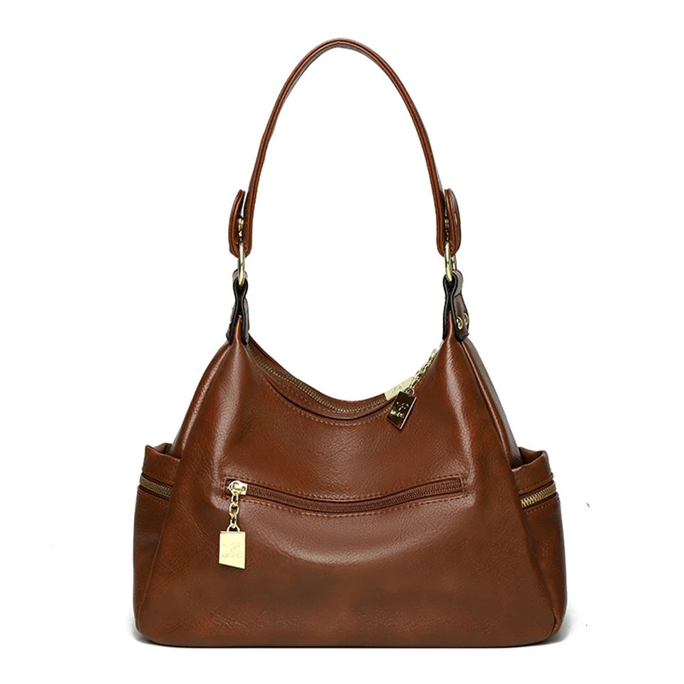 Vintage womens leather shoulder bag luxurious womens large capacity handbag casual shoulder bag fashionable Versatile bag 240930