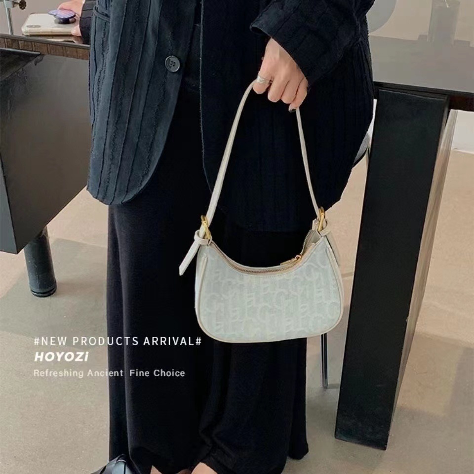 2025 New outdoor style luxury free delivery Designer Bag niche canvas for women autumn and winter new shoulder bag