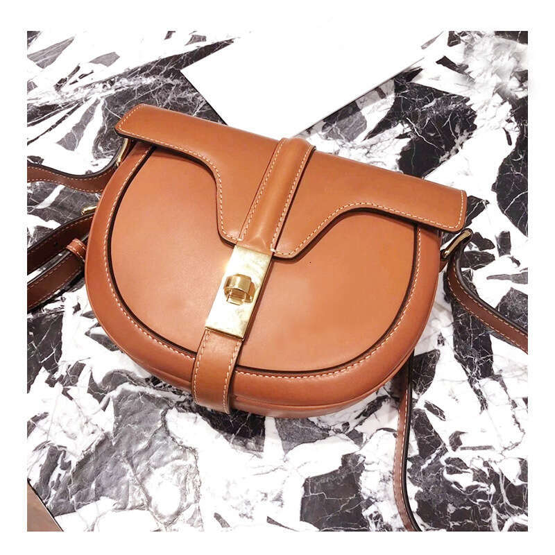 New Fashion Semicircle New Cow Leather Small Women Famous Brand Saddle Designer Lock Shoulder Crossbody Mini Bag Classic bags
