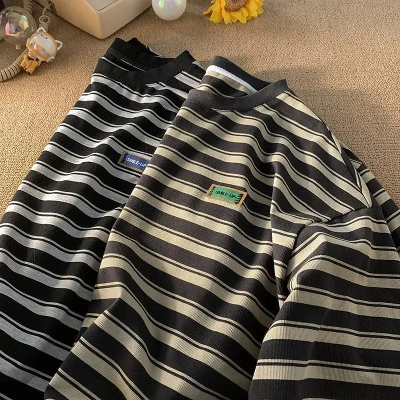 European and American retro striped graphic Tshirt for men and women summer trend loose fitting couple casual short sleeved top 240930