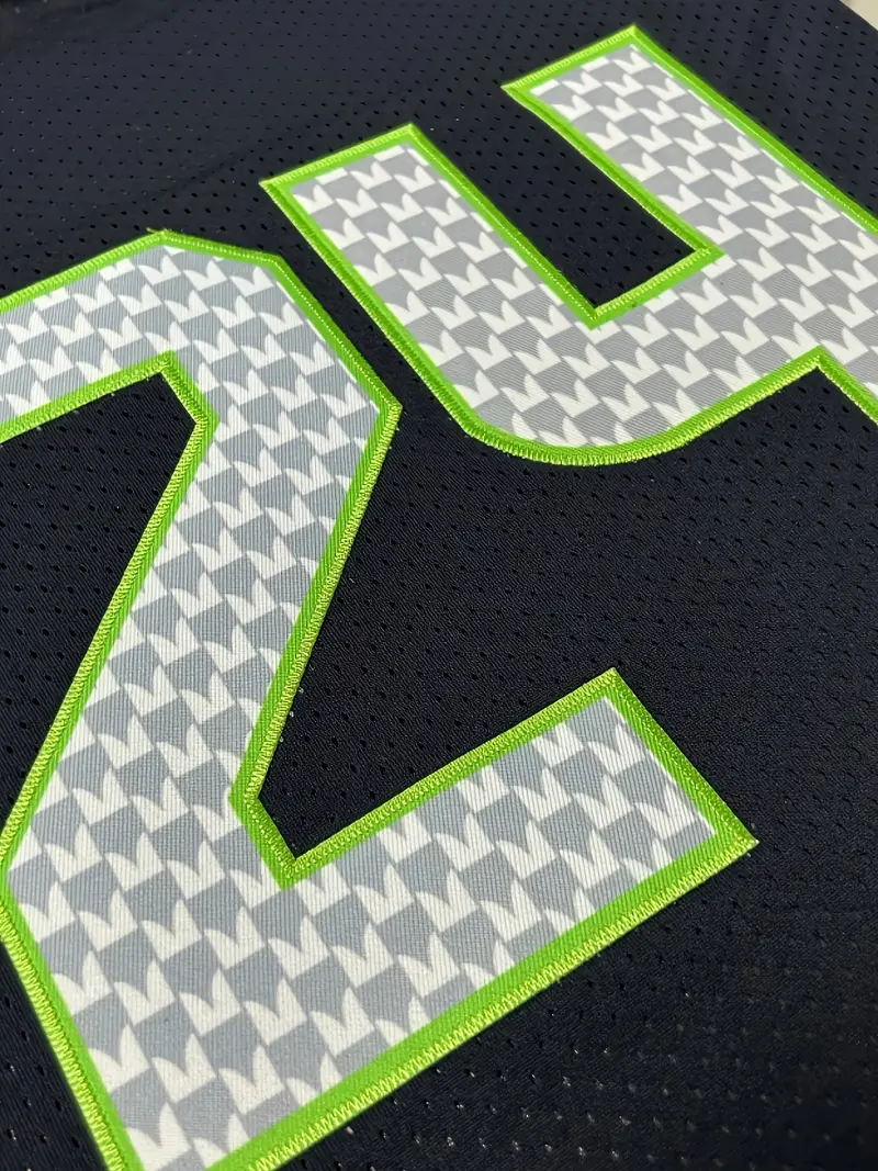 #24 Marshawn Lynch Comfy V-Neck Football Jersey Navy Blue Mesh Embroidery for Training and Competition Breathable Moisture-Wicking American Football S