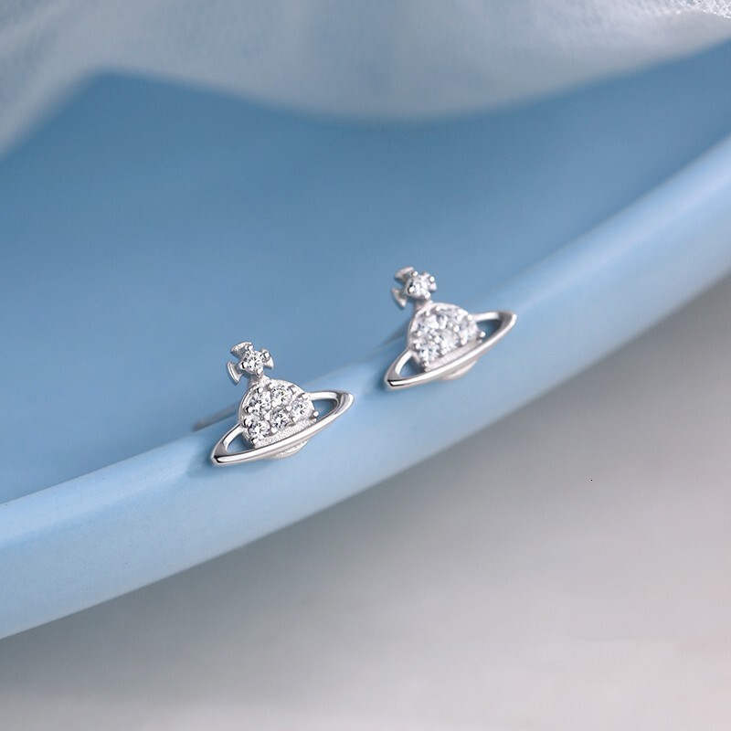 Pure sier needle planet light , 2024 new item, niche design earrings, women's winter earrings