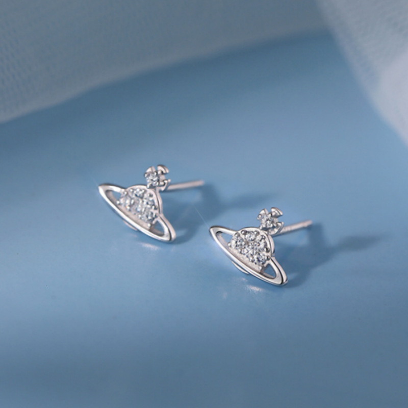 Pure sier needle planet light , 2024 new item, niche design earrings, women's winter earrings