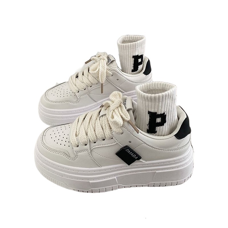 casually elegant ladies white sneakers featuring a robust outsole for warm weather fashion