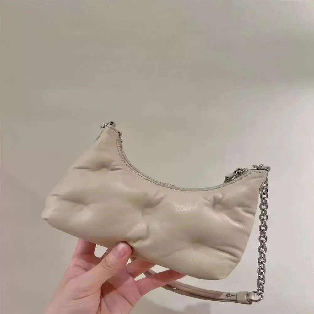 Light High Quality 2024 New Lambskin Women's Half Moon Type Armpit Fashion Trend Shoulder Cloud Bag