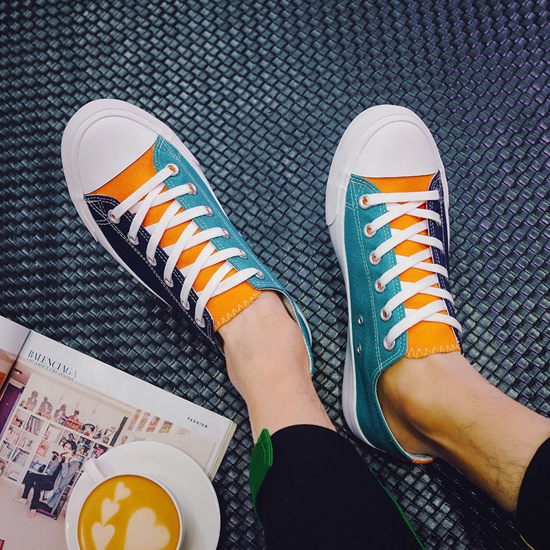 2024 new designer color blocked canvas Korean version casual low top flat bottom fashionable men's breathable social fabric shoes