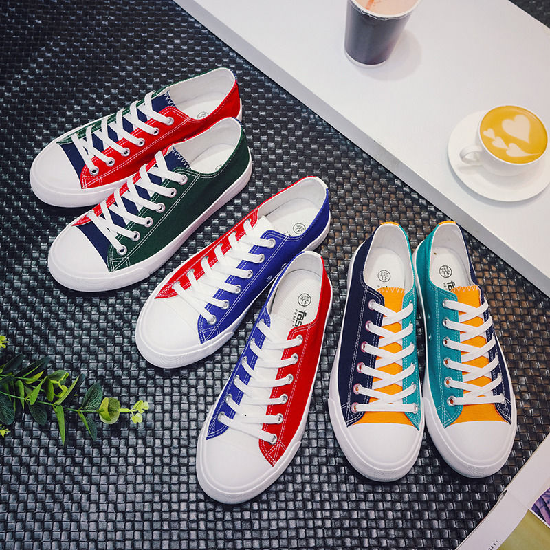 2024 new designer color blocked canvas Korean version casual low top flat bottom fashionable men's breathable social fabric shoes