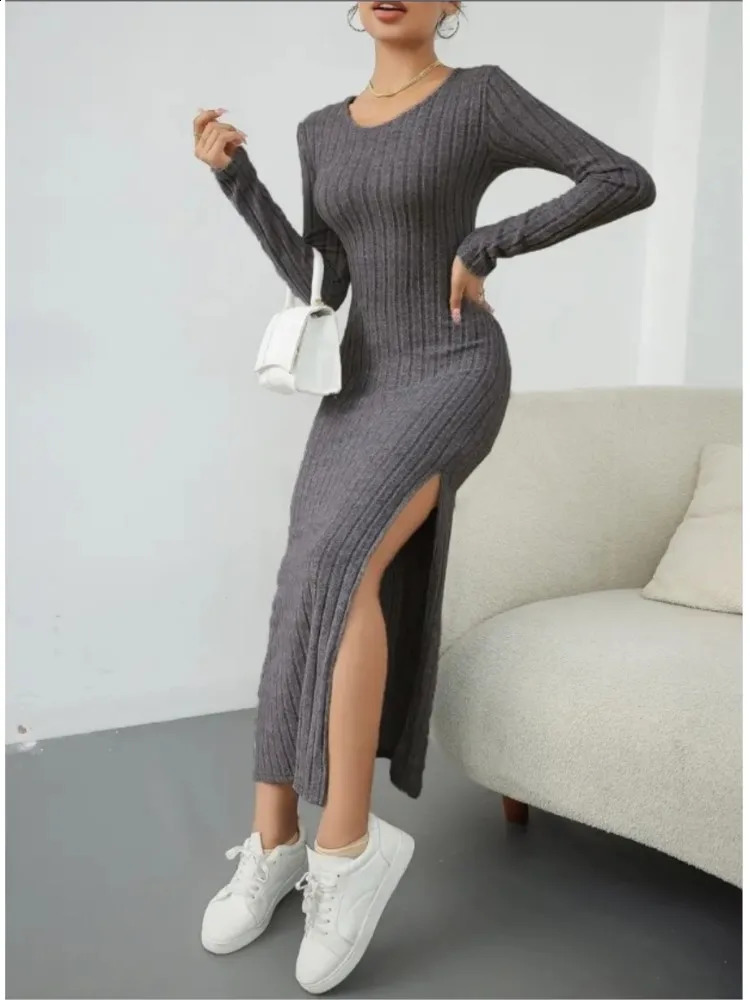 Autumn and winter womens solid color long sleeved round neck sexy seam knitted casual comfortable dress 241007