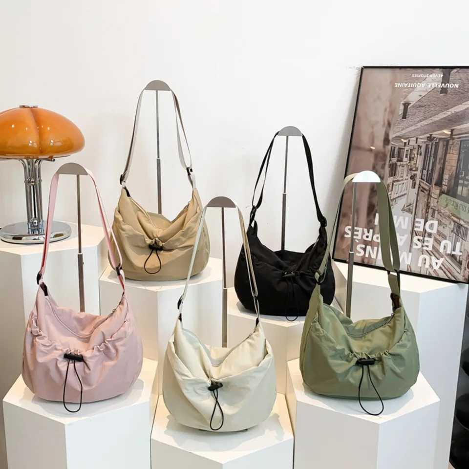 New niche design nylon shoulder bag fashionable solid color pleated cross body bag casual classroom decoration saddle bag Z250225