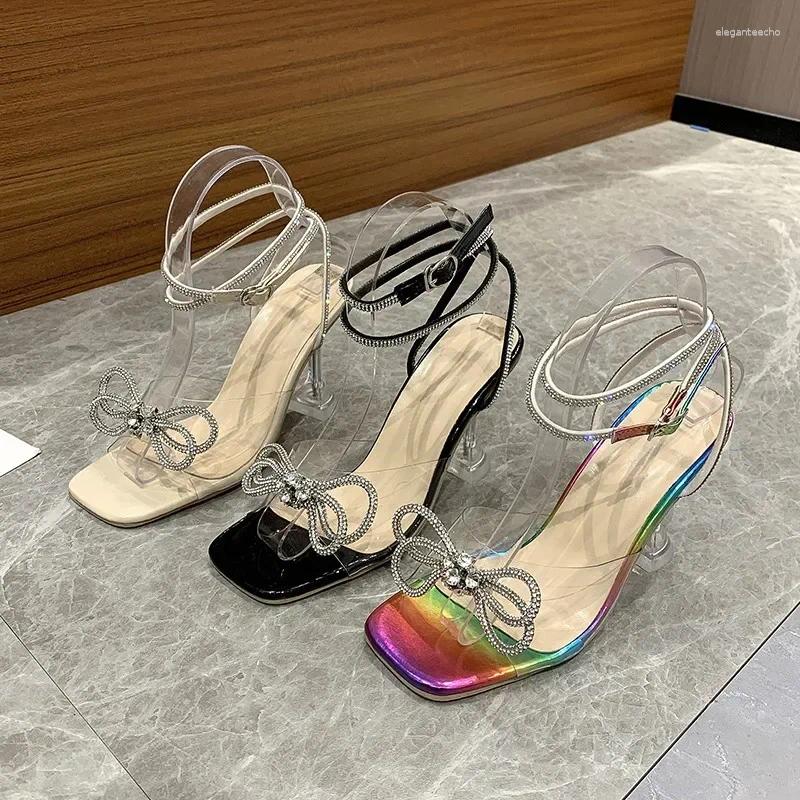 2025 S Fashion Designer Sandals Sexy Rhie Bowknot Women S PVC Jelly Transparent High Heels Summer Ankle Buckle Strap Party Shoe