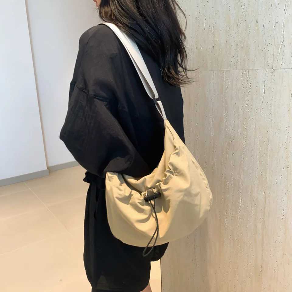 New niche design nylon shoulder bag fashionable solid color pleated cross body bag casual classroom decoration saddle bag Z250225