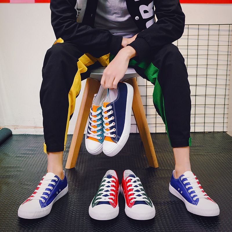 2024 new designer color blocked canvas Korean version casual low top flat bottom fashionable men's breathable social fabric shoes