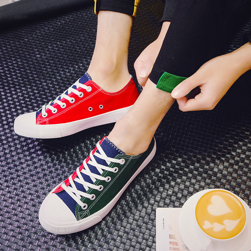 2024 new designer color blocked canvas Korean version casual low top flat bottom fashionable men's breathable social fabric shoes