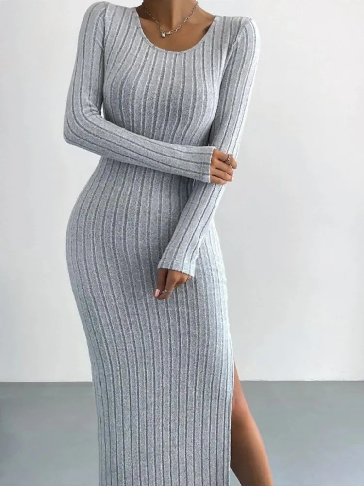 Autumn and winter womens solid color long sleeved round neck sexy seam knitted casual comfortable dress 241007