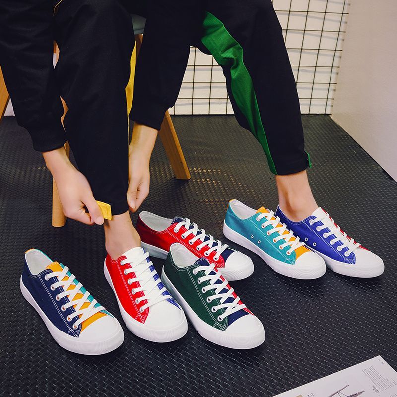 2024 new designer color blocked canvas Korean version casual low top flat bottom fashionable men's breathable social fabric shoes