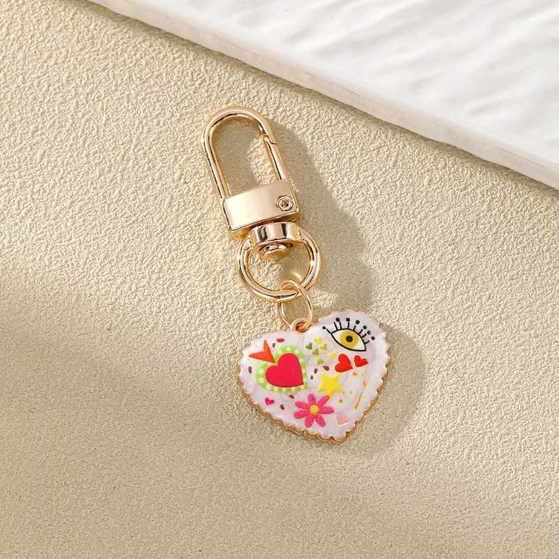 Personality Ethnic Eyes Heart Keychain for Women Fashion Printed Drop Oil Flower Key Buckle Handbag Earphone Case DecorationX241008