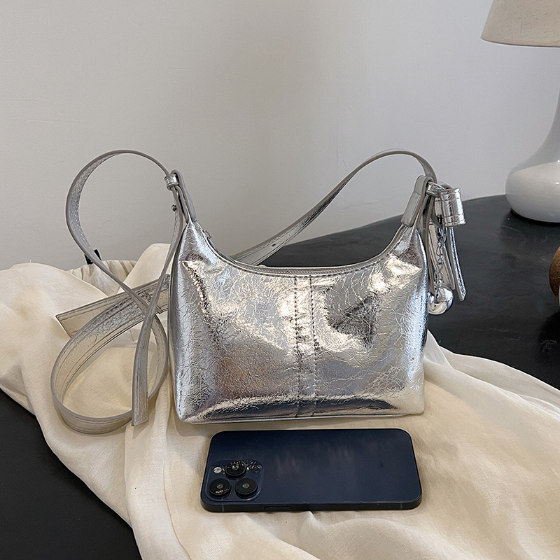 Small Niche Design, Oil Wax Leather Material, Bell Decoration, 2024 New Temperament Women's Handbag, Pillow Bag, Dumpg Bag