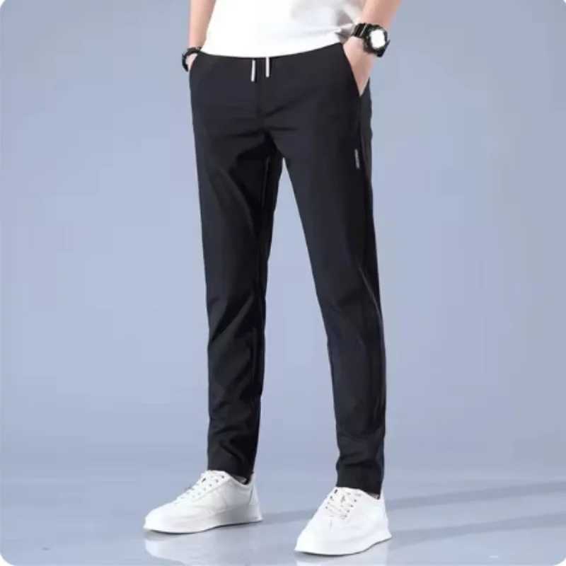 New Spring Summer Mens Casual Pants Slim Pant Straight Thin Trousers Male Fashion Stretch Khaki Jogging M-5XLX241008