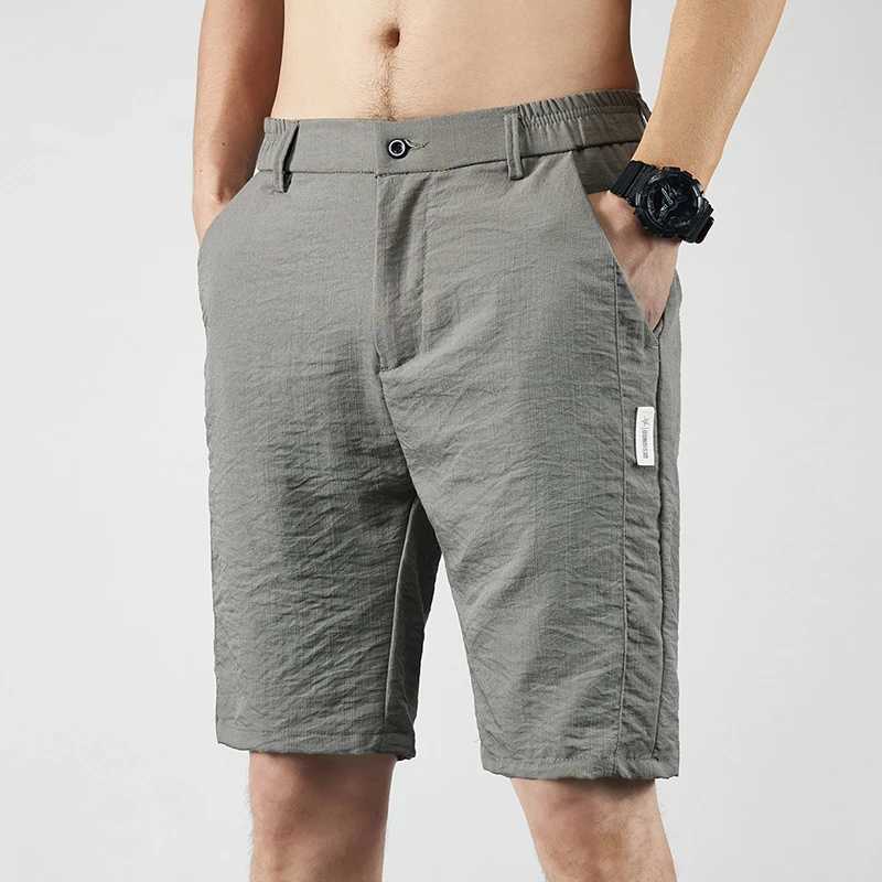 Summer thin ice silk casual shorts solid color mens lightweight elastic straight beach casual shorts mens sports loose shortsW240713
