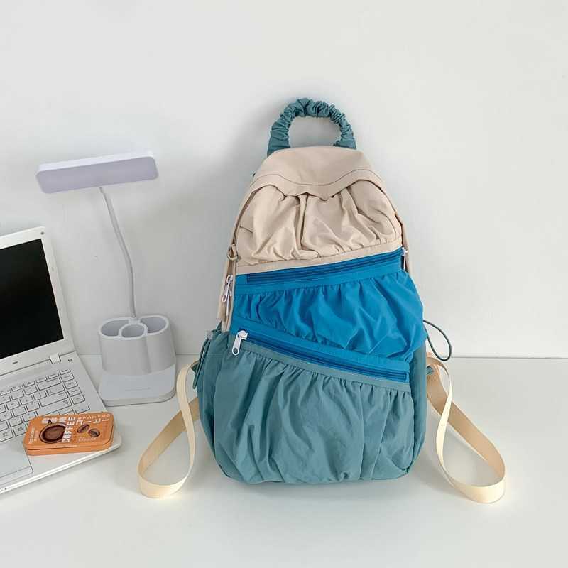 women's summer backpack with Korean style nylon fabric, large capacity casual pleated splicing design, contrasting color backpack 241015