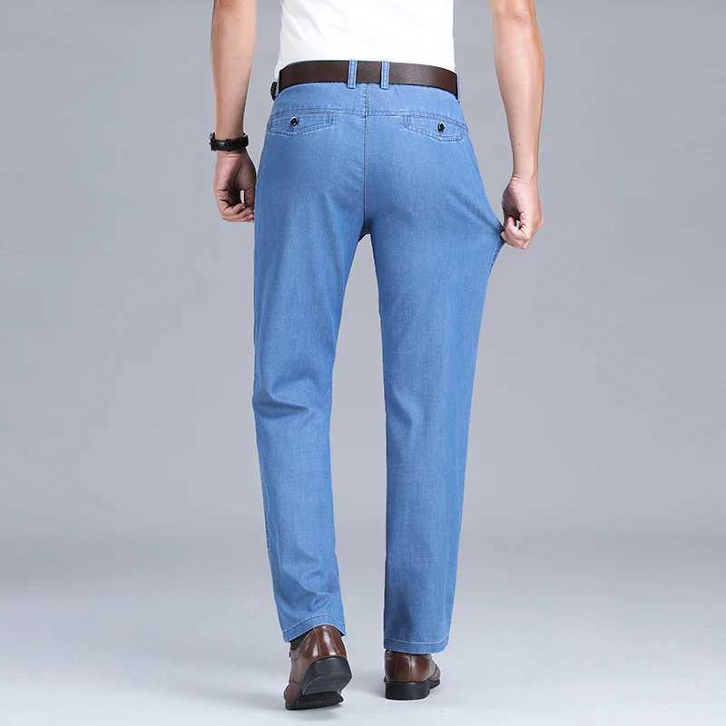 2024 Spring/Summer New Mens Thin Light Blue Loose Jeans Commercial Fashion Lyocell Fabric Elastic Denim Trouser Mens Brand PantsW240715
