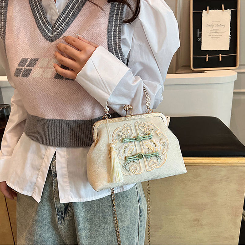 New Chinese style handbag for women 2024, with high appearance, gentle, young and beautiful. Handheld, single shoulder, crossbody, large capacity