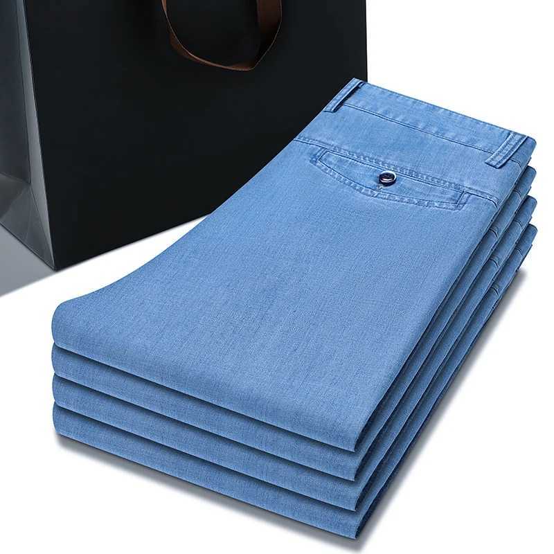 2024 Spring/Summer New Mens Thin Light Blue Loose Jeans Commercial Fashion Lyocell Fabric Elastic Denim Trouser Mens Brand PantsW240715