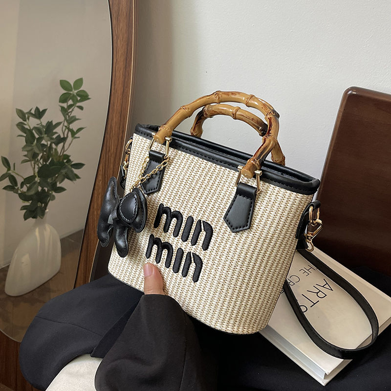High look straw woven western high-end fashion 2024 new designer handbag Internet celebrity letter travel exquisite messenger bag