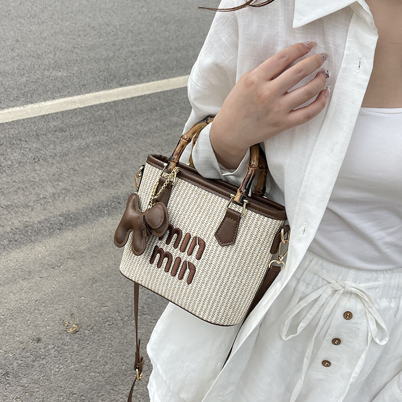 High look straw woven western high-end fashion 2024 new designer handbag Internet celebrity letter travel exquisite messenger bag