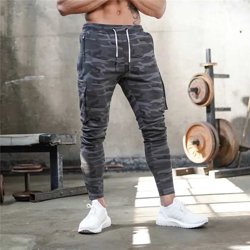 2023 NEW Men pants Sweatpants Man Gyms Workout Fitness Sports Trousers Male Running Skinny Track Pants Training Jogger Pants menX241008