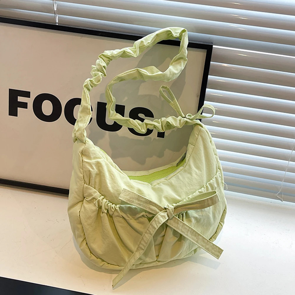 Womens fashionable shoulder bag with Ruched drawstring strap bow simple cross solid color cute sling womens daily handbag 241008