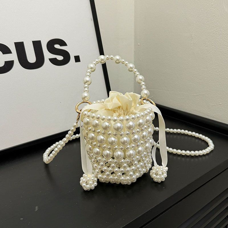Fairy 2024 new designer handbag fashion fragrance woven pearl handbag fashion horizontal hollow bag