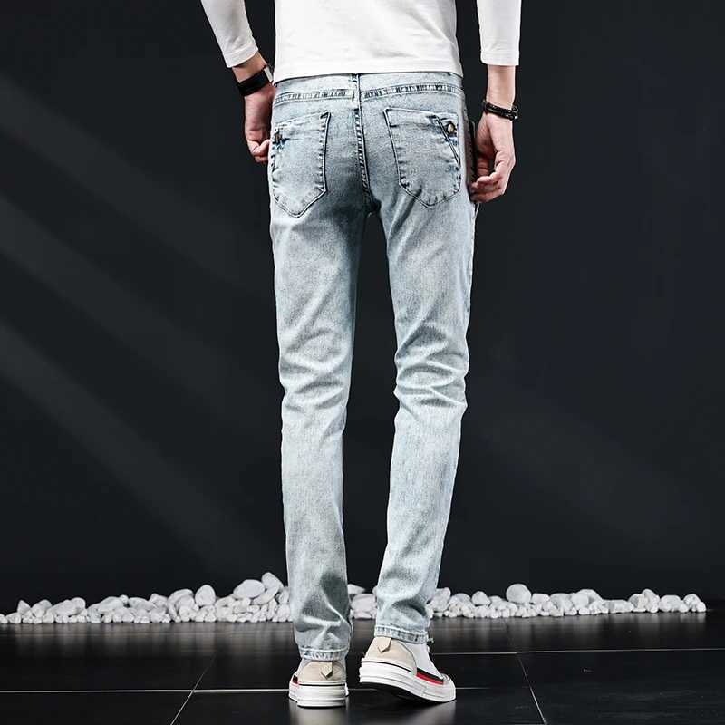 Ultra thin tight jeans mens new elastic Korean design fashionable multi button blue and white retro washed cotton elastic denim pants TrouserW240715