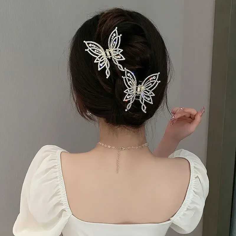Korean style elegant warm pearl rhinestone high-end womens shark clip metal hollow butterfly grip clip half tied hair W241007