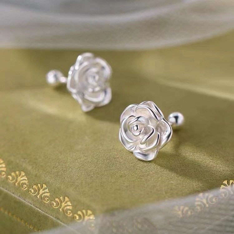 Pure sier needle mountain camellia 2024 new light high-end for niche women's earrings