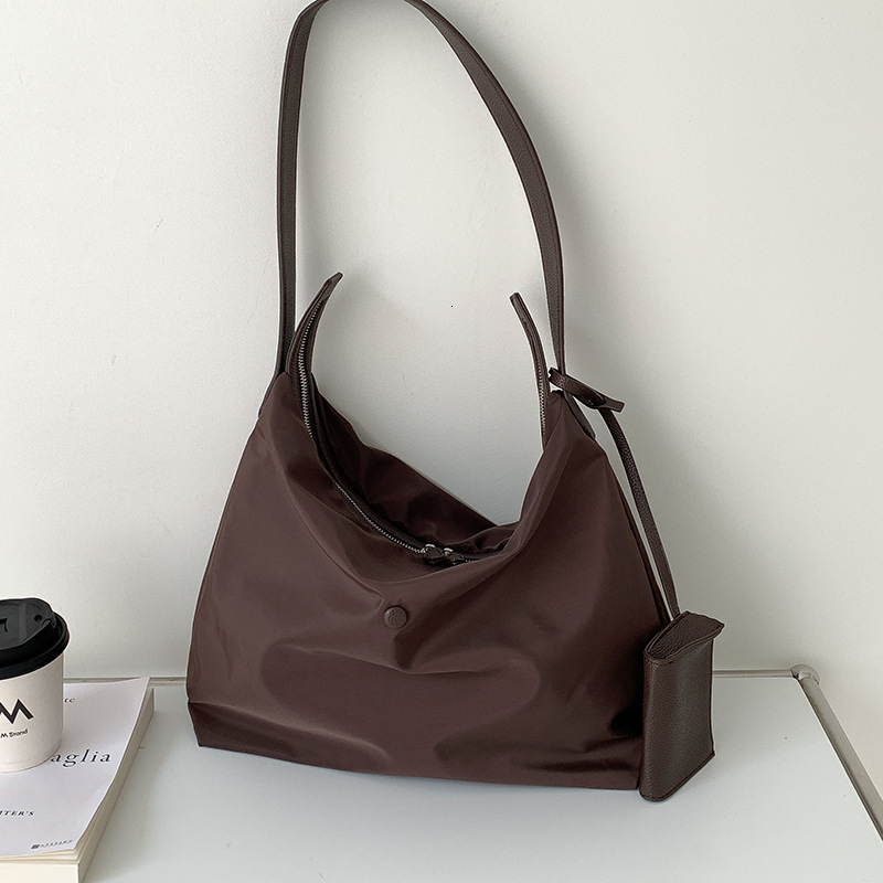 Korean casual nylon shoulder women's large capacity commuting bag, solid color versatile splicing waterproof tote bag