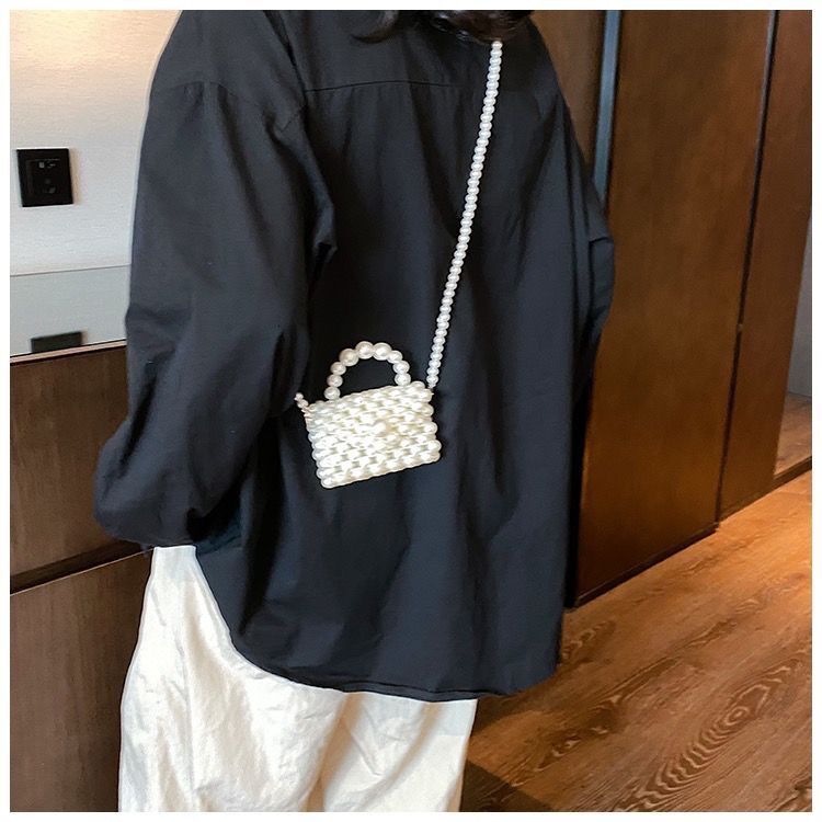 2024 new designer handbag pearl handbag women's niche handmade high-end multifunctional pearl shoulder chain small bag ins crossbody bag