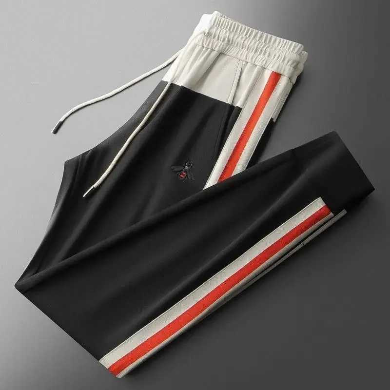 Luxury brand mens long pants with bee embroidery 2024 new spliced sports pants summer lightweight and trendy golf pantsX241008