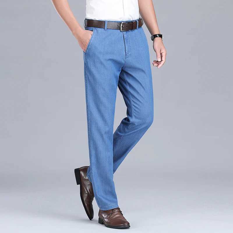 2024 Spring/Summer New Mens Thin Light Blue Loose Jeans Commercial Fashion Lyocell Fabric Elastic Denim Trouser Mens Brand PantsW240715