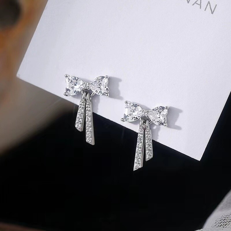 Pure sier needle bow light earrings, niche design, high-end feeg, delicate earrings for women