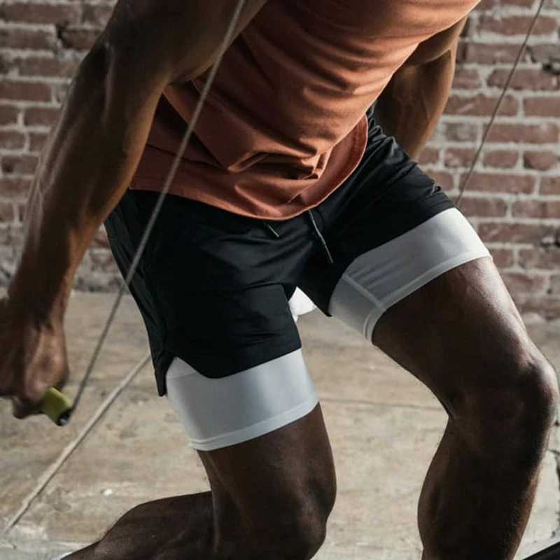 Summer Mens Trend Fitness Shorts Outdoor Fitness Running Bike Shorts Quick drying Double layer 2-in-1 Mens ShortsW240713