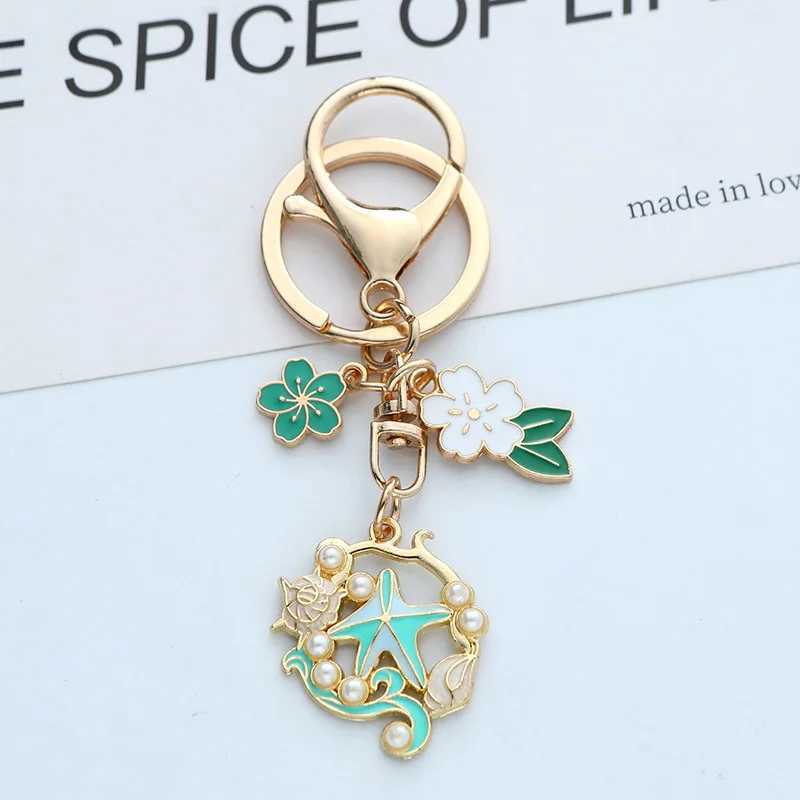 Ocean Style Drop Oil Shell Starfish Cherry Blossoms Keychain Fashion Creative Gold Color Metal Keychain Bag Car Key DecorationX241008