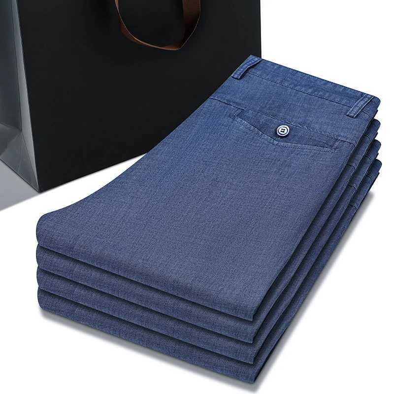 2024 Spring/Summer New Mens Thin Light Blue Loose Jeans Commercial Fashion Lyocell Fabric Elastic Denim Trouser Mens Brand PantsW240715