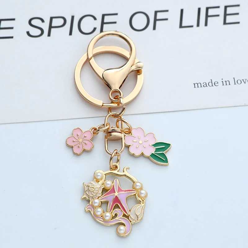 Ocean Style Drop Oil Shell Starfish Cherry Blossoms Keychain Fashion Creative Gold Color Metal Keychain Bag Car Key DecorationX241008